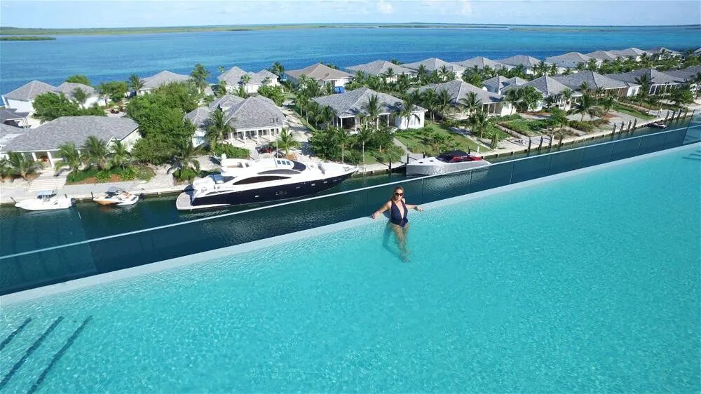 Rooftop infinity pool at the Hilton at Resorts World Bimini overlooking the marina