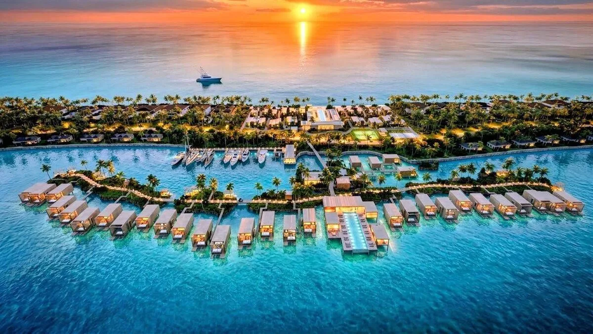 Rendering of overwater bungalows and the marina at sunset